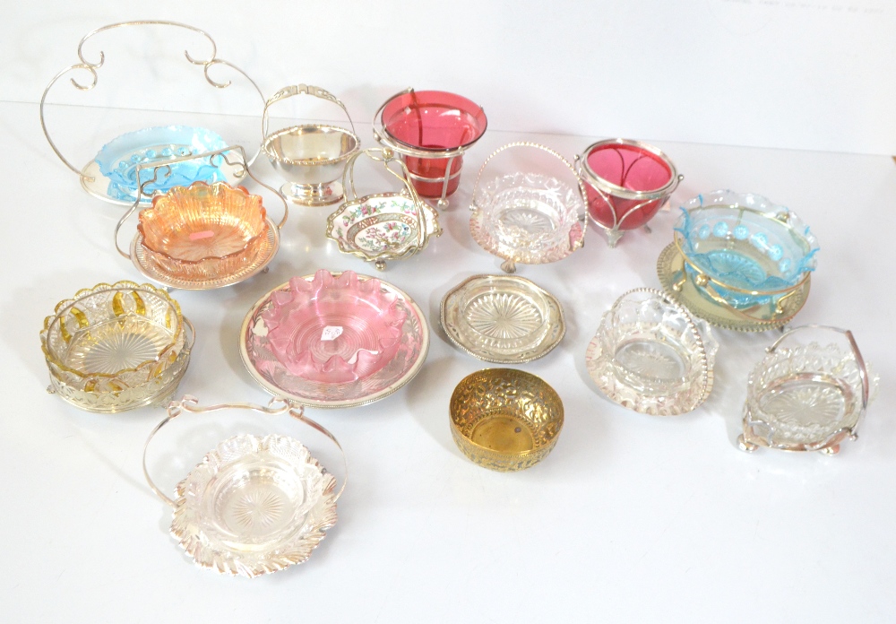 A group of silver plate mounted coloured and clear glass butter dishes and bowls.Additional