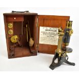 J B DANCER OF 43 CROSS STREET MANCHESTER; a black lacquered and brass plated microscope, with