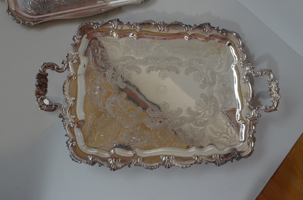 CHARLES HOWARD COLLINS; a silver plated twin handled tray with cast foliate scroll rim and - Image 2 of 5
