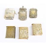 Six late 19th century and later silver plated vesta cases to include an Art Nouveau example embossed