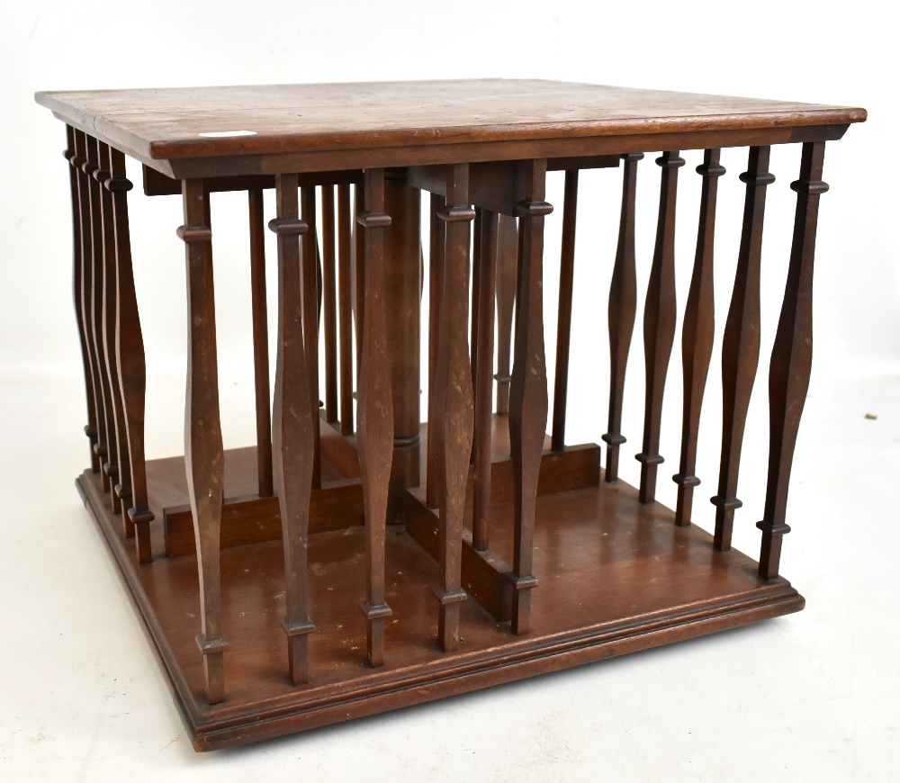 An Edwardian mahogany tabletop revolving bookcase, height 32cm, diameter 39.5cm.Additional