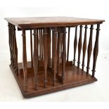 An Edwardian mahogany tabletop revolving bookcase, height 32cm, diameter 39.5cm.Additional