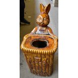 An unusual late 19th century Chinese terracotta glazed garden seat modelled as a rabbit wearing a