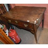 An 18th century oak side table with single frieze drawer on column supports, height 73cm, length