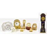 An Aesthetic Movement blue ceramic miniature longcase clock, the gilded dial set with Roman