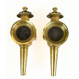 A pair of brass carriage lamps with fixtures, length 34cm (2).Additional InformationOne glass
