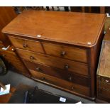A Victorian mahogany straight front chest of two short over three long drawers, raised on plinth
