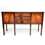 A reproduction mahogany sideboard with three central drawers flanked by two panelled cupboard doors,