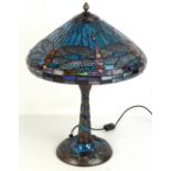 A modern Tiffany style desk lamp with stained decoration depicting dragonflies, height 57cm.