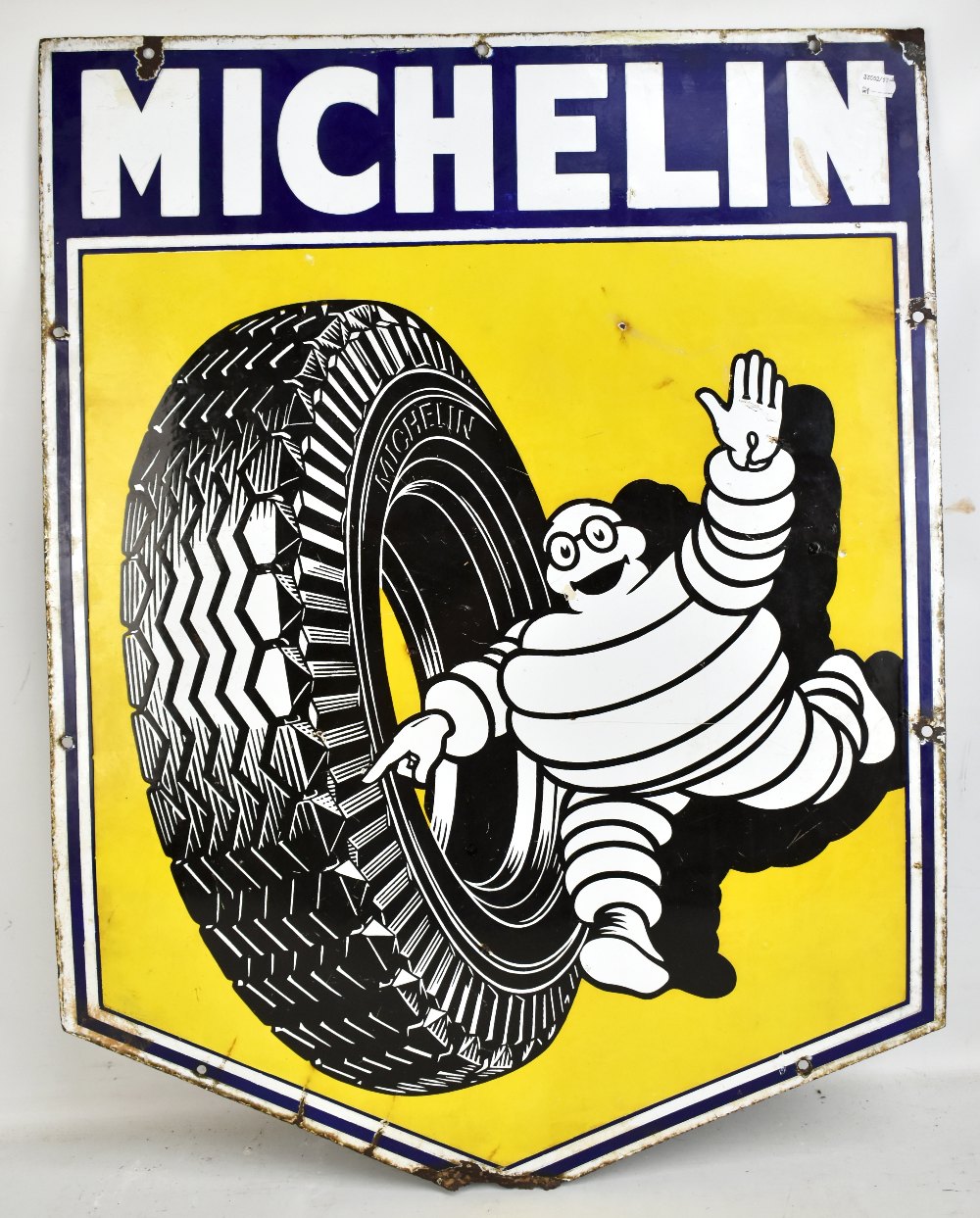 MICHELIN; a pictorial enamel advertising sign of shield form, height 79cm, width 61cm.Additional