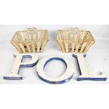 Three vintage painted metal letters 'POL', heights approx 30cm, and two pierced metal baskets.