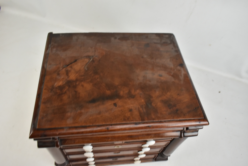 A Victorian mahogany miniature chest with secret drawer above two short and three long drawers, with - Image 3 of 4