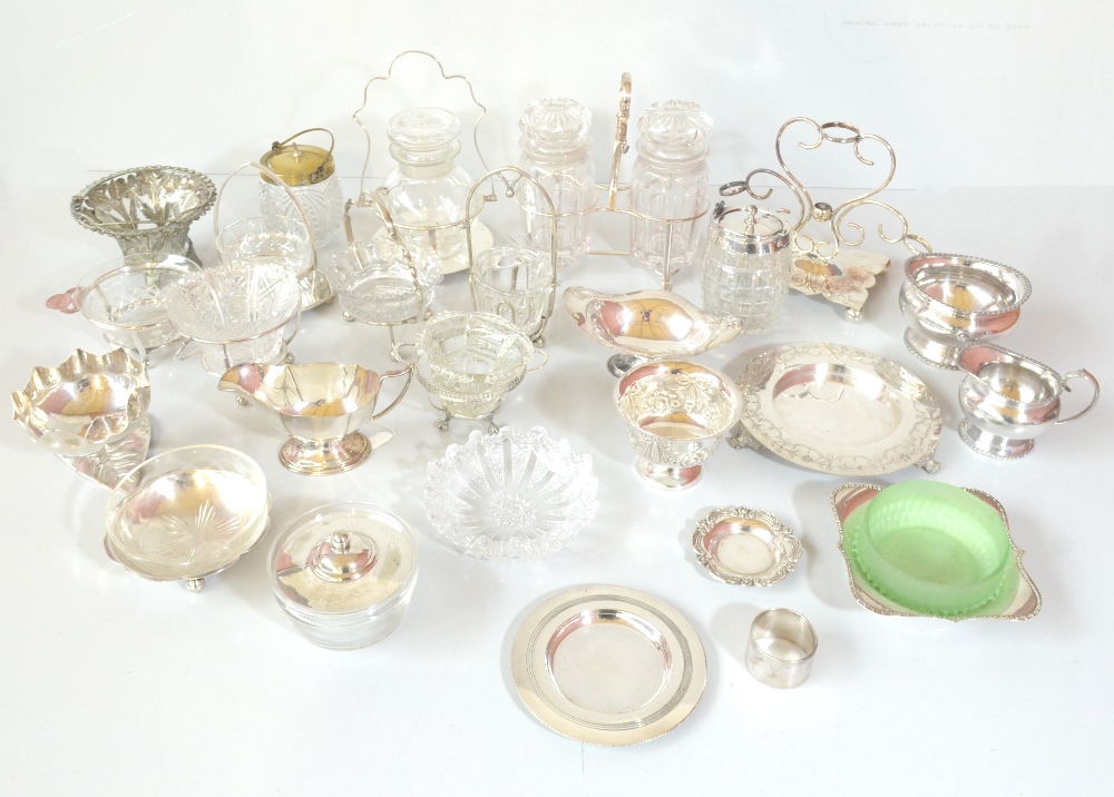 A group of silver plate mounted glass butter dishes and condiment stands, also a small silver plated