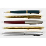 A collection of fountain and ball point pens including Parker example with 14k nib, a cased Sheaffer
