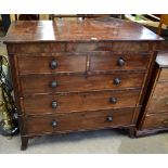 An early 19th century mahogany straight front chest of two short over three long drawers, raised