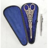 A cased set of silver plated grape scissors with pierced floral detail to the handle, length 18cm,