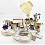 A group of 19th century and later silver plate and metalware to include a swing handled basket,