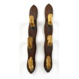A pair of oak mounted hat racks fashioned from deer hooves, length 52cm.Additional