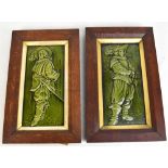 A pair of rectangular Minton's majolica tiles relief decorated with cavaliers, 29.5 x 14cm, each