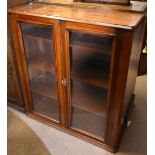 An early 20th century stained mahogany twin door bookcase, height 102.5cm, length 92cm, depth 29.5cm