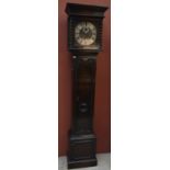 An early 20th century oak longcase clock, the brass face with silvered dial set with Roman and