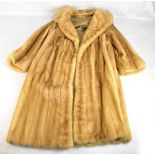 A full length silk lined mink coat, not labelled, width under arms approx 60cm.Additional