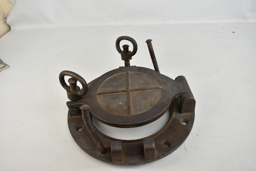 J STONE & CO OF DEPTFORD LONDON; a large brass porthole with swinging cover and lock and screw - Image 3 of 4