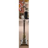 An early 20th century chromed Corinthian column standard lamp with three sockets and stepped section