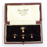 A cased set of 9ct yellow gold shirt studs, approx. 2.7g, fitted in original box. Additional