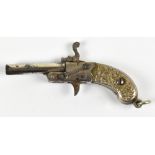 A late 19th/early 20th century Berloque type miniature pistol with chased detail to the grip, length
