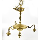A late 19th/early 20th century brass ceiling light raised on single cylindrical twisted stem with