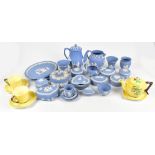 WEDGWOOD; twenty-five pieces of blue jasperware to include coffee pot, milk jug, a Carlton ware part