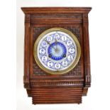 CHARLES FRODSHAM OF PARIS; an Aesthetic Movement wall clock with carved oak case housing a blue