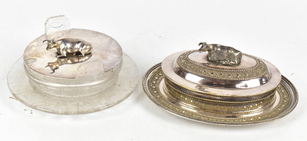 A Victorian silver plated butter dish and cover, the finial in the form of a bull, length 20cm,