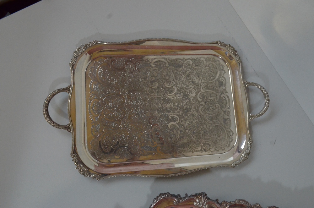 CHARLES HOWARD COLLINS; a silver plated twin handled tray with cast foliate scroll rim and - Image 3 of 5