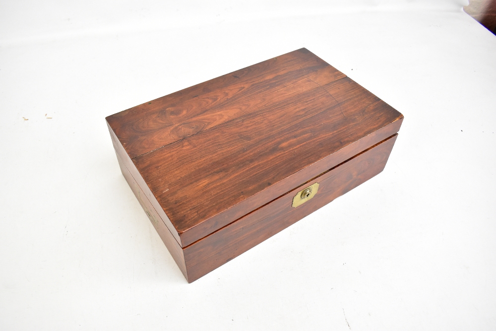 An early 19th century rosewood campaign writing slope with recessed brass side handles, gilt - Image 2 of 2