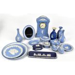 WEDGWOOD; a collection of assorted blue jasperware to include mantel clock, height 22.5cm, bud