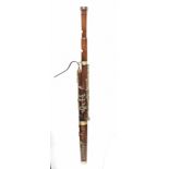 BUFFET CRAMPON AND CO PARIS; an early 20th century rosewood bassoon with nickel plated mounts,