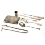 A group of hallmarked silver and white metal items to include a silver cigarette case, sugar soon,