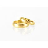 Two 22ct gold wedding band rings, size I and K, combined approx 9.1g (2).