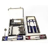 A cased set of hallmarked silver handled pastry forks, a cased set of silver handled knives,