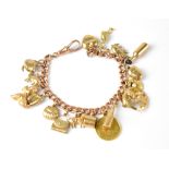 A 9ct rose gold charm bracelet with seventeen gold charms and an Edward VII 1905 half sovereign,
