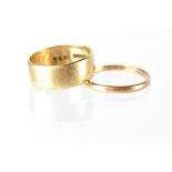 Two 9ct gold band rings, a gentlemen's wide band, size V and a ladies' thin band, size W,