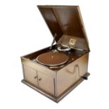 An HMV Model 103 hand-cranked gramophone with a number 4 sound box in oak case,