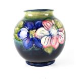 A Moorcroft 'Anemone' pattern vase of bulbous form, blue ground, impressed signature in blue,