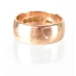 A gentlemen's 9ct gold band ring, size P/O, approx 6.95g.