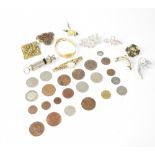 A small collection of costume jewellery to include two ladies' watches, brooches,