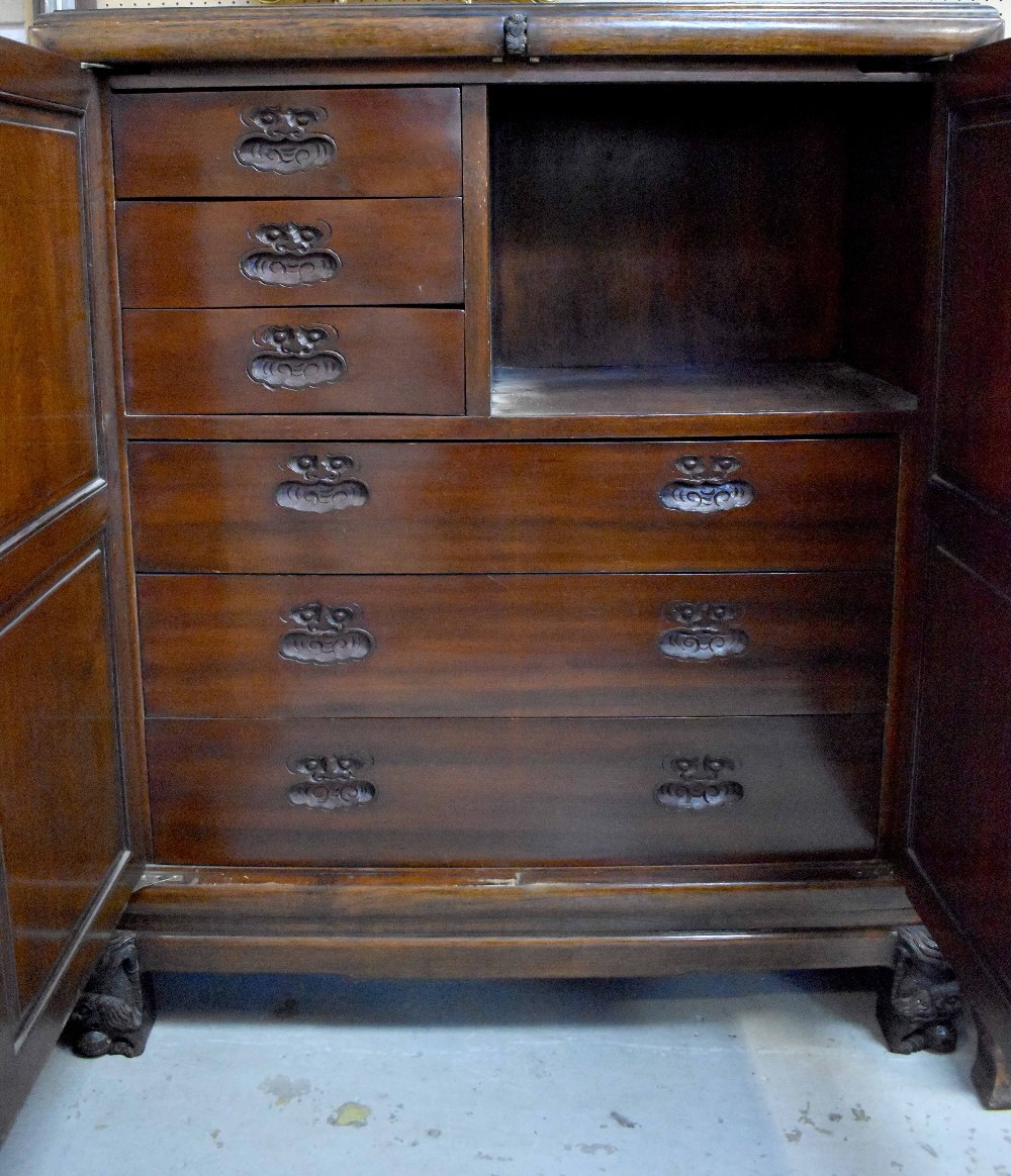 An early/mid-20th century Chinese oak and hardwood cabinet with fitted interior, - Image 4 of 5