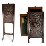 A 19th century adjustable oak fire screen,