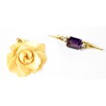 A 9ct gold amethyst and white stone brooch, hallmarked,